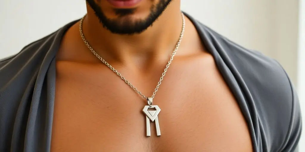 A man wearing a fashionable pendant necklace.