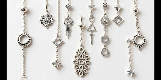 Collection of sterling silver belly button jewelry pieces.